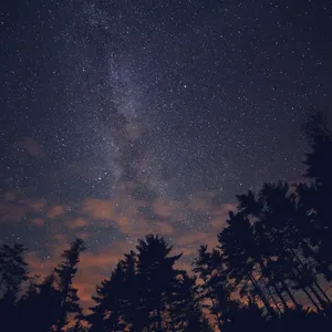 Nighttime View Of A Star Covered Sky Wallpaper