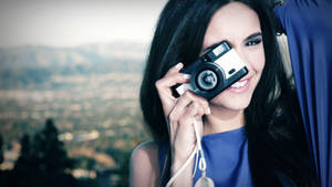 Nina Dobrev With A Camera Wallpaper