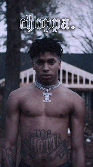 Nle Choppa Topless With Chains On Wallpaper