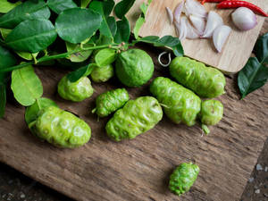 Noni Fruits On The Table Wallpaper