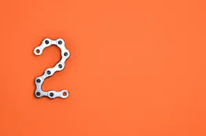 Number 2 Simple Orange Gears Wallpaper