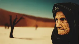 Old Woman In The Desert Wallpaper