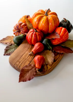 Orange And Green Pumpkin On Brown Wooden Round Plate Wallpaper