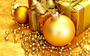 Orange Christmas Balls With Gifts Wallpaper