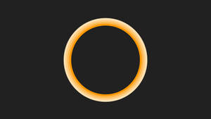 Orange Circle On Black Wallpaper