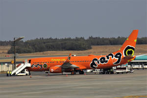 Orange Mango Airlines Passenger Plane Wallpaper