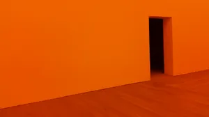 Orange Room With Open Door Wallpaper