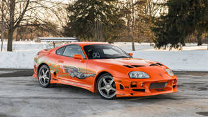 Orange Toyota Supra At Winter Wallpaper