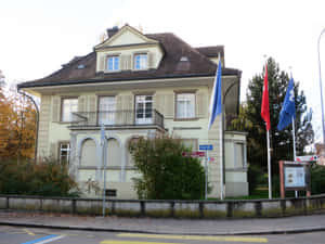 Ortsmuseum_ Dietikon_ Building_with_ Flags Wallpaper