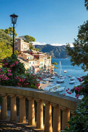 Overlooking Sea And Mountains In Portofino Italy Wallpaper
