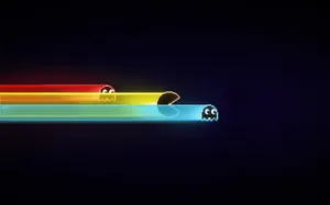Pac Man Racing Against Ghosts Wallpaper