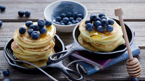 Pancakes On Pan With Berries Wallpaper