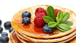 Pancakes Topped With Berries Wallpaper