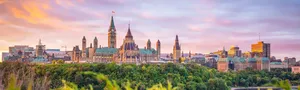 Panoramic View Of Parliament Hill In Ottawa Wallpaper