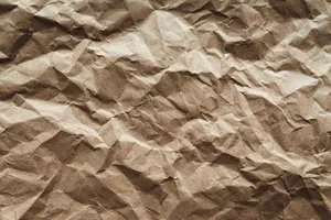Paper In Brown Color With Crumpled Texture Wallpaper