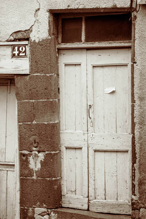 Paranormal Wooden Door In Sepia Wallpaper