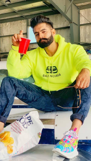 Parmish Verma Eating Snacks In Balenciaga Wallpaper