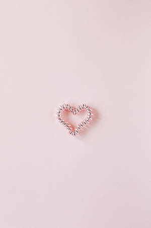 Pastel Pink Heart Spiral Hair Tie Wallpaper