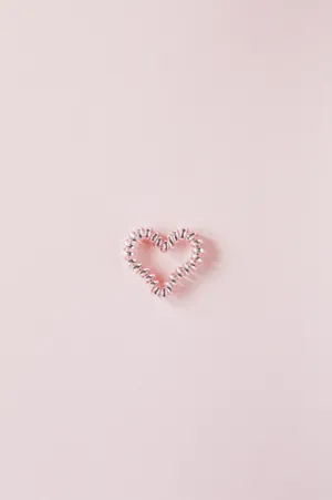 Pastel Pink Heart Spiral Hair Tie Wallpaper
