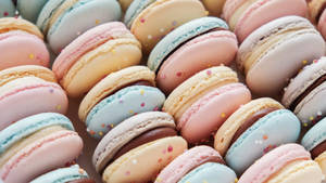 Pastel Pink Macaroons With Sprinkles Wallpaper