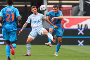 Patryk Klimala Against Luis Perea Wallpaper