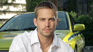 Paul Walker Posing Front Of Car Wallpaper