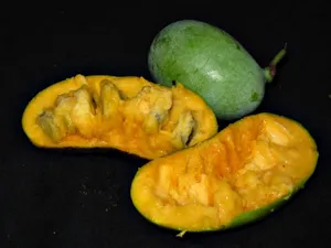 Pawpaw Fruit Halvedand Whole Wallpaper