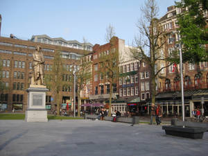 Peaceful Day At Rembrandtplein Amsterdam Wallpaper