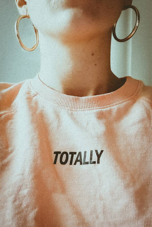 Peach Shirt With Bold Font Wallpaper