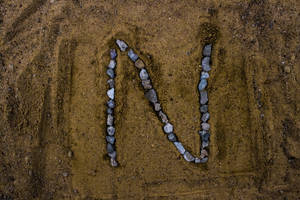 Pebbles Letter N Wallpaper