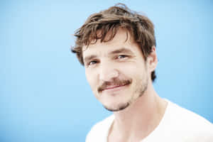 Pedro Pascal Smiling Portrait Wallpaper