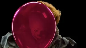 Pennywise Alongside A Red Balloon Wallpaper