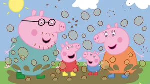 Peppa Pig And Her Family Jumping In Muddy Puddles. Wallpaper