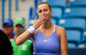 Petra Kvitova Blowing A Kiss During A Tennis Match Wallpaper