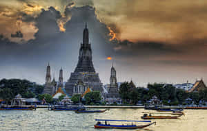 Photograph Of Wat Arun In Dark Period Wallpaper