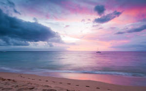 Pink Aesthetic Ocean At Dusk Wallpaper