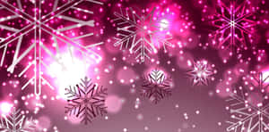 Pink Christmas Glowing Snowflakes Wallpaper