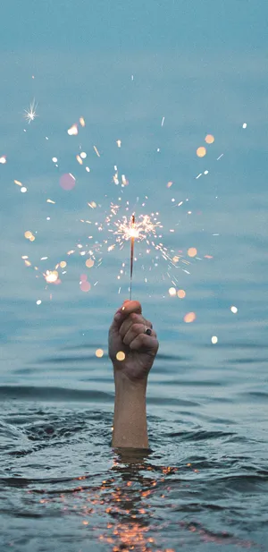 Pixel 3 Xl Hand Sparkler Wallpaper