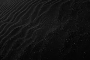 Plain Black Desktop With Sand Ridges Wallpaper