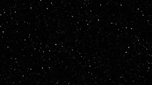 Plain Black Desktop With Twinkling Stars Wallpaper