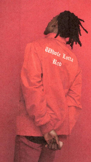 Playboi Carti In Vibrant Red Attire Wallpaper