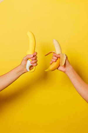 Playful Sensuality With Fruit And Toys Wallpaper