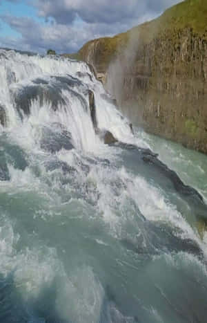 Plunging Gullfoss Waterfall In Southwest Iceland Wallpaper