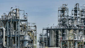 Port Harcourt Refinery Operator At Work Wallpaper