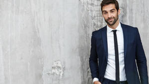 Portrait Elegant Young Man Suit Wallpaper