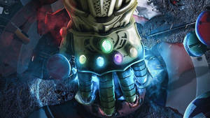 Power In The Universe: Thanos Wields The Infinity Gauntlet, Each Gem Empowering The Titan With The Strength Of The Universe. Wallpaper