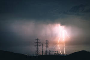 Power Of Lightning: Electric Poles Taking A Strike Wallpaper