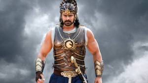 Prabhas As A Valiant Warrior In Battle Wallpaper