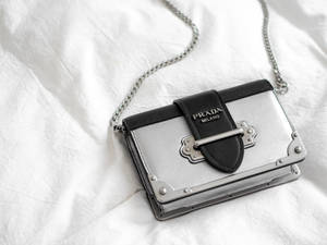 Prada Sling Bag In Bed Wallpaper