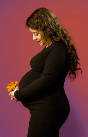 Pregnant Belly Long Black Dress Wallpaper